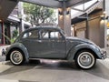 Grey Volkswagen VW beetle classic car on display atÃÂ showroom parked. Royalty Free Stock Photo